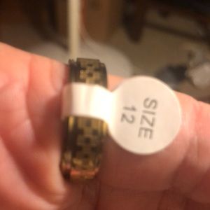Men’s size 12 gold ion plated over stainless steel ring.